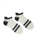Two pairs of white socks with black stripes on a white background